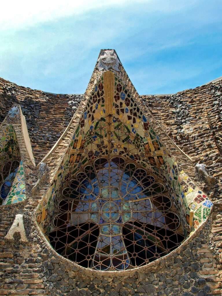 Trencadís mosaic and the great window of Gaudí's crypt at Colònia Güell
